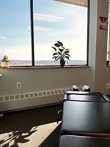Adjusting table by a sunny window